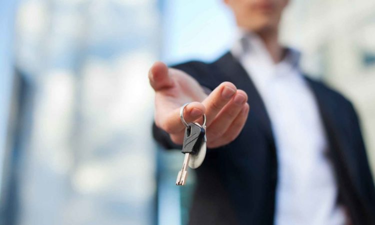 Man with keys in his hand